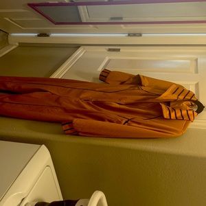 Orange and black jumpsuit brand new size 10